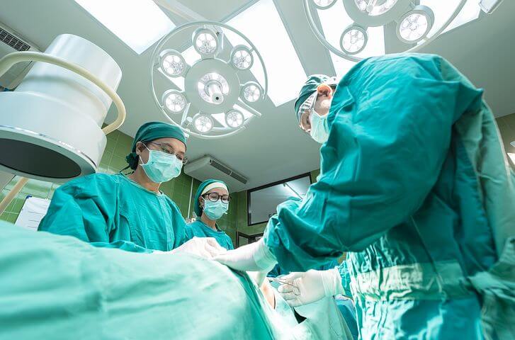 Medical Staff Operating On Patient
