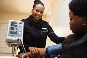 Nurse Taking Patient's Blood Pressure