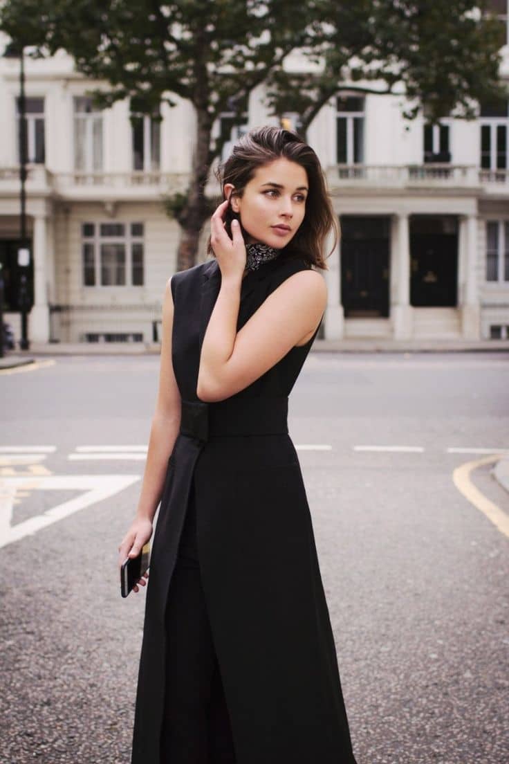 Woman wearing black sleeveless dress